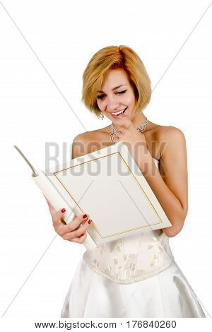 Happy girl in a white evening dress and necklace. Bare shoulders. Butch. Isolated on white background