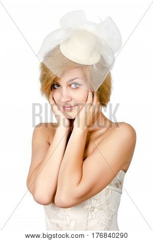 Happy girl in a white evening dress and necklace. Bare shoulders. Butch. Isolated on white.
