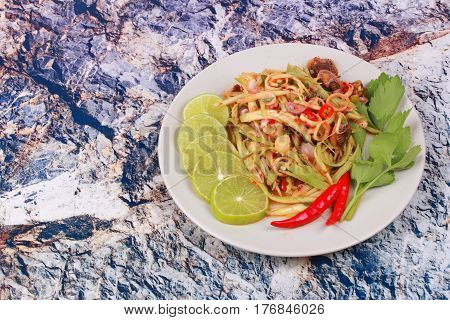 Spicy Minced Mango Salad With Soft-boiled Blood Cockles.