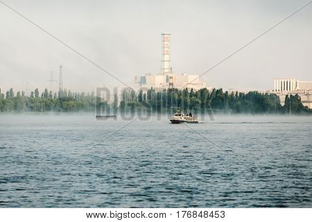 Kursk NPP. View from the technological cooling pond. Early foggy morning.