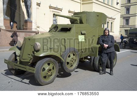 SAINT PETERSBURG, RUSSIA - MAY 05, 2015: Soviet armored car BA-3 and his driver