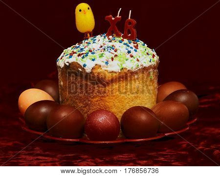 Easter cake and eggs on dark background morning after easter