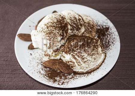 Ice cream is a sweetened frozen food typically eaten as a snack or dessert. It is usually made from dairy products such as milk and cream and often combined with fruits or other ingredients and flavours.