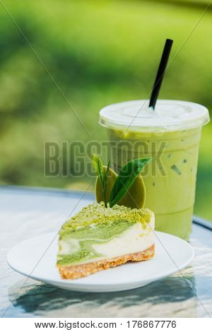 Roll cake and ice green tea popular manu in Shui fong farm Chiang rai Thailand