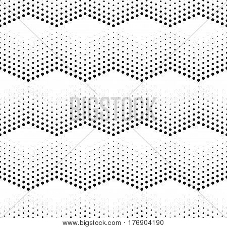 Halftone pattern background. Universal vector seamless pattern. Halftone dots on white background. Screen print texture. Monochrome geometric texture with repeated dots of different sizes.