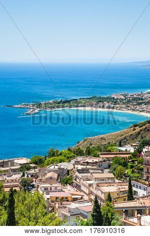 View Of Taormina City And Giardini Naxos Beach