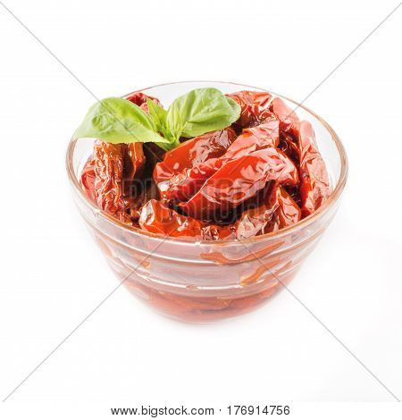 Italian appetizer - sundried tomato in bowl on the white background.