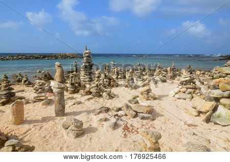 Stone cairns on Baby Beach in Aruba.
