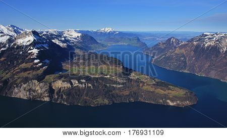 Stunning view from mount Fronalpstock Stoos. Lake Vierwaldstattersee and mountains. Spring scene in the Swiss Alps.