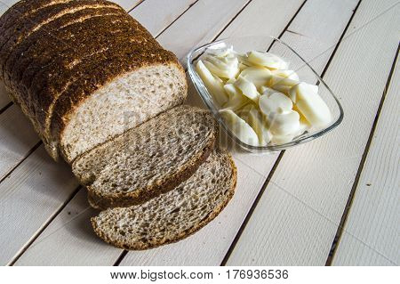 Bran bread and besides black olives, cheese, the most beautiful breakfast cheese and black olives.In different concepts bread, olive and cheese pictures,