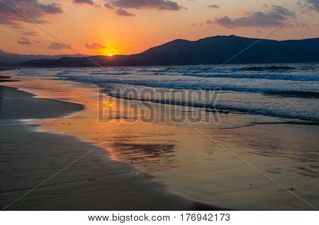 Sunset over the sea on the island of Crete