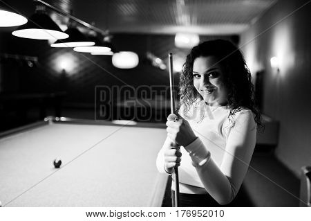 Young Curly Girl Posed Near Billiard Table. Sexy Model At Black Mini Mini Skirt Play Russian Snooker