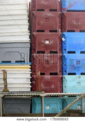 Stacked Fish Packing Crates on a Dock