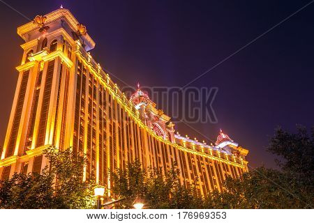 Macau, China - December 8, 2016: perspective view of Galaxy Macau Casino hotel at night, Cotai Strip, the popular street of casinos that annually attracts more than 25 million of people.
