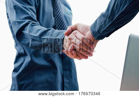 Businessmen shaking hands isolated on white background