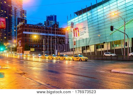Melbourne Australia - December 27 2016: Melbourne taxi cars in the city queued for passengers pickup near Crowne Plaza hotel at night