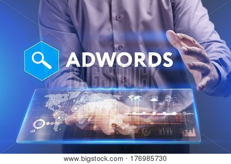 Business, Technology, Internet And Network Concept. Young Businessman Working On A Virtual Screen Of