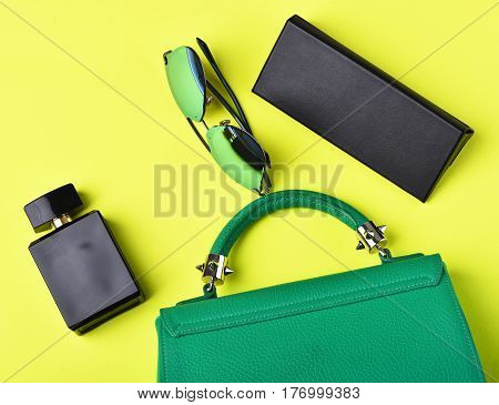 Small Womans Leather Green Bag With Sunglasses, Perfume And Case