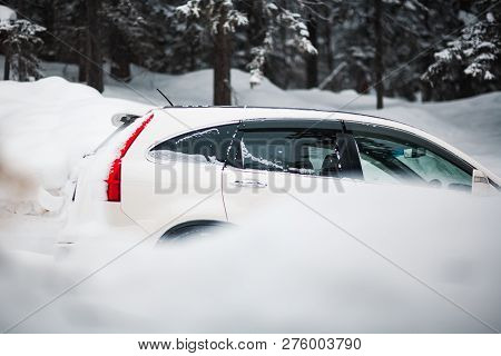Suv In The Snowy Mountains Near Lake Amut Of The Khabarovsk Territory. Russia