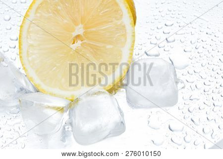 Lemon Ring With Ice On A Silvery Background Closeup