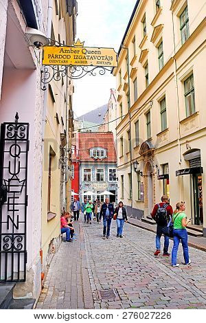 Riga, Latvia - Augustl 28, 2018: View From Kramu Street To The Old Buildings With One Of The Oldest 