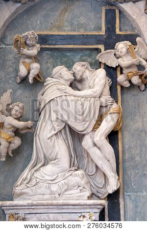 BRONNBACH, GERMANY - JULY 07, 2018: Christ strengthens the praying Bernard of Clairvaux, Bernard altar from the workshop of Michael Kern, Cistercian Abbey of Bronbach in Reicholzheim near Wertheim, Ge