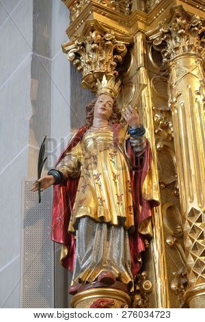 LUCERNE, SWITZERLAND - JUNE 24, 2018: Statue of Saint, Saint Nicholas altar in the church of St. Leodegar in Lucerne, Switzerland
