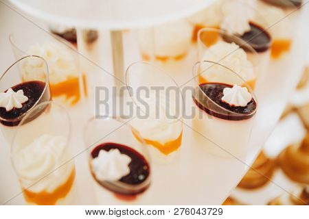 Assortment Of Pieces Of Cake On Messy Table, Copy Space. Several Slices Of Delicious Desserts, Resta