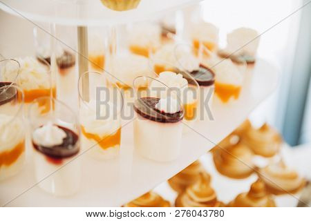 Assortment Of Pieces Of Cake On Messy Table, Copy Space. Several Slices Of Delicious Desserts, Resta