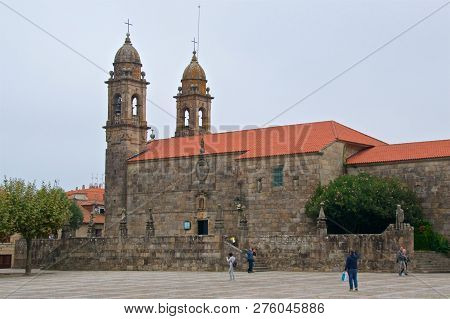 Cambados, Spain - September 2018: Locals Going To San Benito Church At Pazo De Fefinans In Cambados,