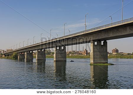 Panoramic View Of Large Concrete Road Bridge Spanning Large Wide Nile River In Egypt At Kom Ombo