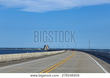 Dauphine Island Parkway Near Coden With Spectacular Bridge Under Blue Sky