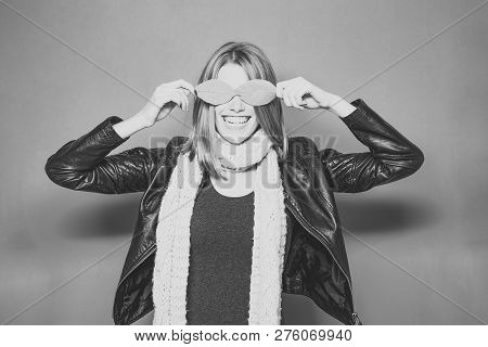 Smiling Model With Stylish Hair In Scarf. Woman With Autumn Leaves As Glasses In Leather Jacket. Bea