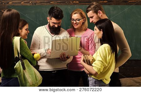 College And University Concept. Group Of Students, Groupmates Spend Time With Teacher, Lecturer, Pro