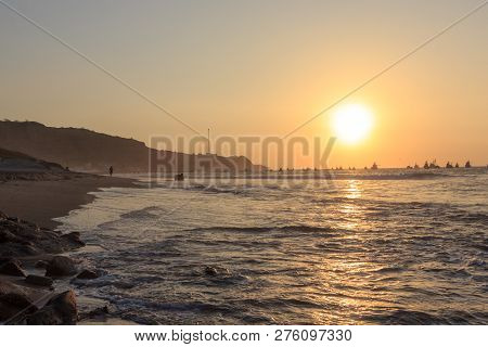 Sunset At The Ocean At Mancora Beach In Peru
