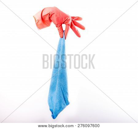 Close Up Of Rubber Gloves Holding Dirty Rug With Disgusted Feeling