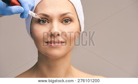 Permanant Makeup Tattoo. Woman Face Skin Care. Cosmetologist Female Mikrobleyding