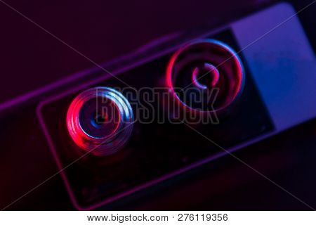 Close Up Of Some Electronic Stuff In Neon Light