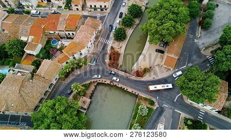 Aerial Top View Of Boats And Lock In Canal Du Midi, Road And Bridge From Above, Southern France