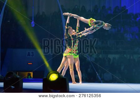 Moscow, Russia - November 16-17, 2018: Acrobats Daria Tikhomirova, Inna Yumashev And Sophia Polishch