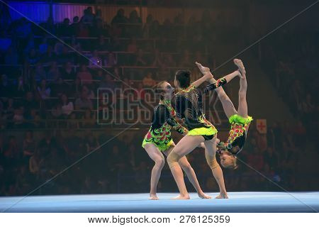 Moscow, Russia - November 16-17, 2018: Acrobats Daria Tikhomirova, Inna Yumashev And Sophia Polishch