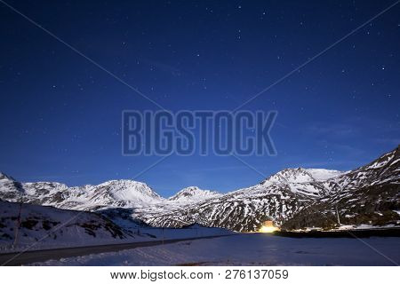 Night Landscape. Starry Sky With The Milky Way Over The Mountain Simplon - An Alps Pass (long Exposu