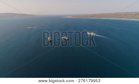Public Ferry Ships Carrying Passengers From Gilimanuk Harbour Ferry Port In Bali Island To Ketapang 