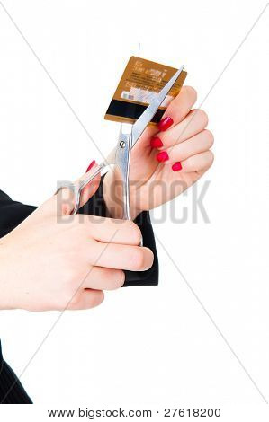 มือพร้อม scissor บัตรเครดิต แยกต่างหากมากกว่าสีขาว