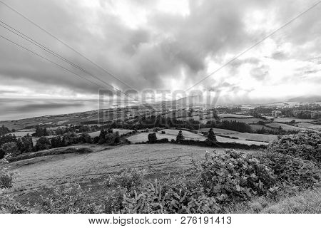Black And View Of Pasture Land Above The Towns Of Vila Franca Do Campo And Ribeira Seca On Sao Migue