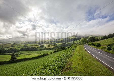 A Beautiful Roadside View Of Fast Moving Rain Clouds Near The Town Of Vila Franca Do Campo In Sao Mi