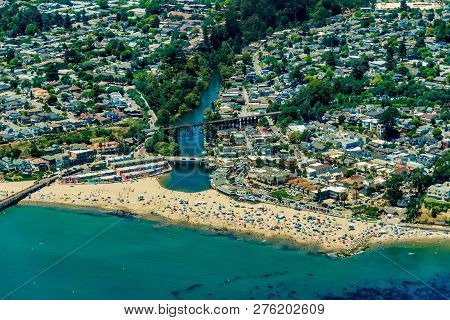 The Aerial View Of The Beach With Tourists In The City Of Capitola In Northern California, Close To 