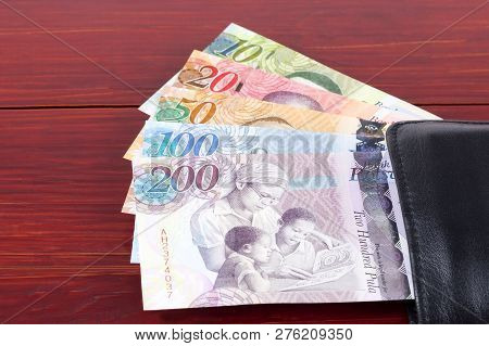 Money From Botswana In The Black Wallet