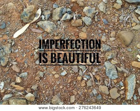 Motivational And Inspiratonal Quote - Imperfection Is Beautiful With A Background Of Stones And Dirt