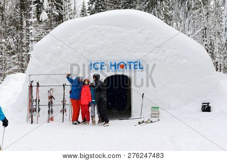 Bukovel, Ukraine - December 25:  The Skiers Making Selfie Near Ice Hotel In Bukovel Ski Resort. It I